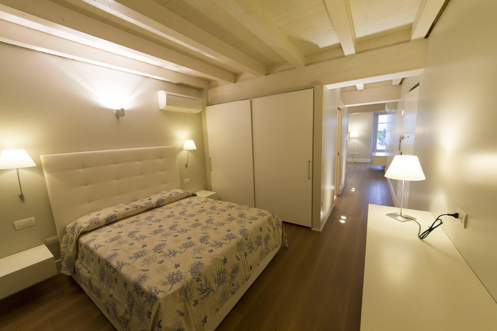 La Casa Del Porto Apartment โลเวเร ภายนอก รูปภาพ